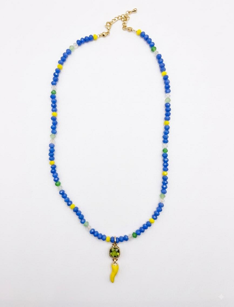 Collana con perline sfaccettate blu elettrico e corno giallo