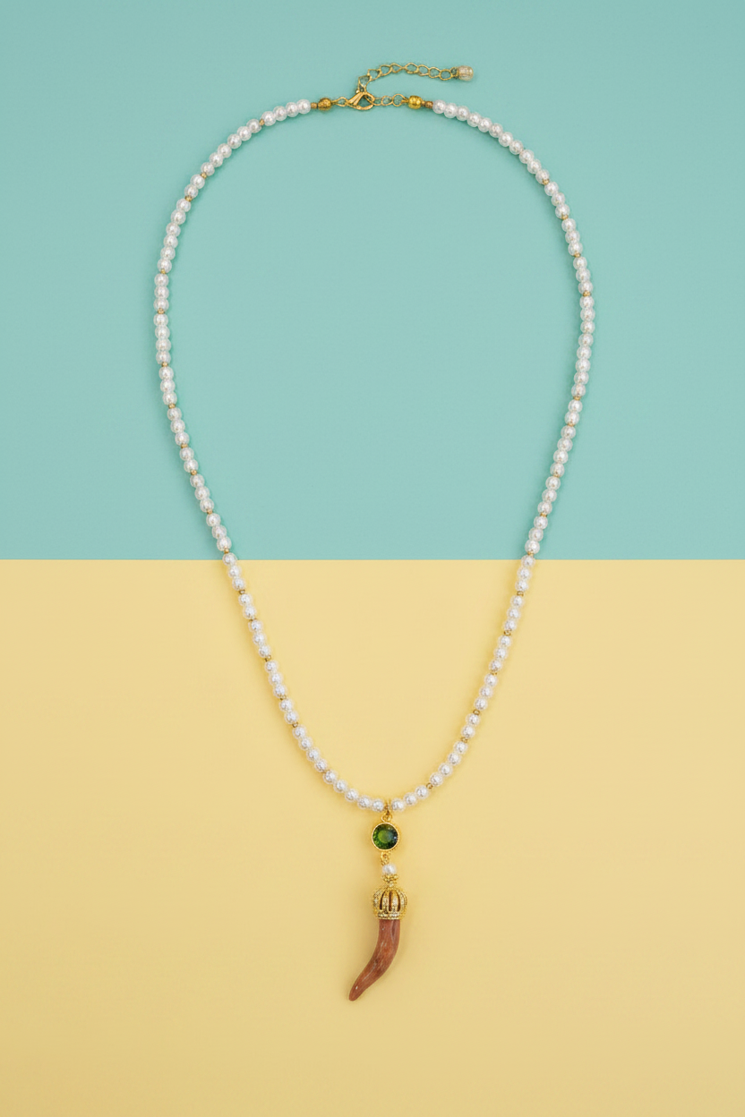 Collana corno ceramica - sfondo turchese/giallo
